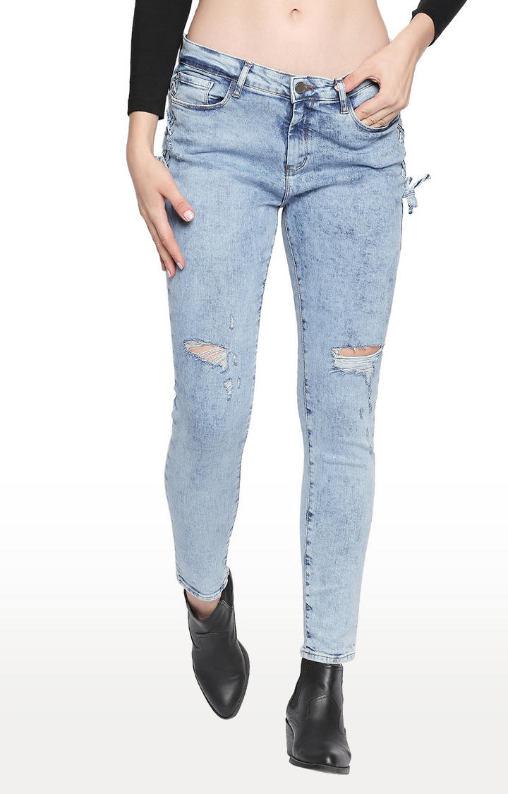 blue ripped slim jeans