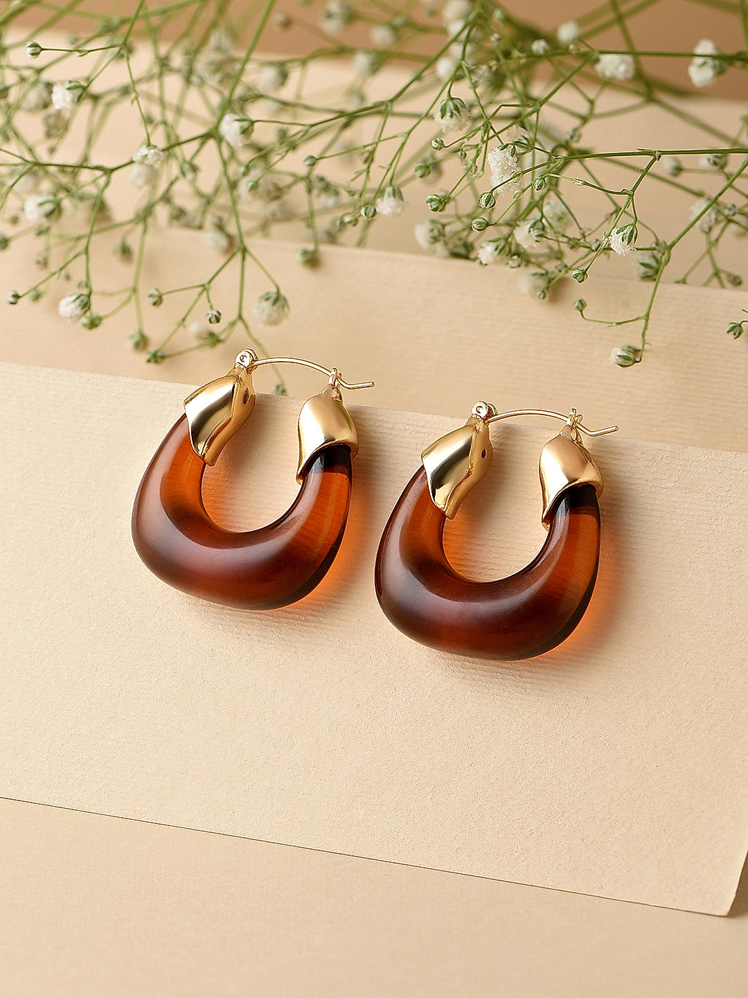 Tups earrings top