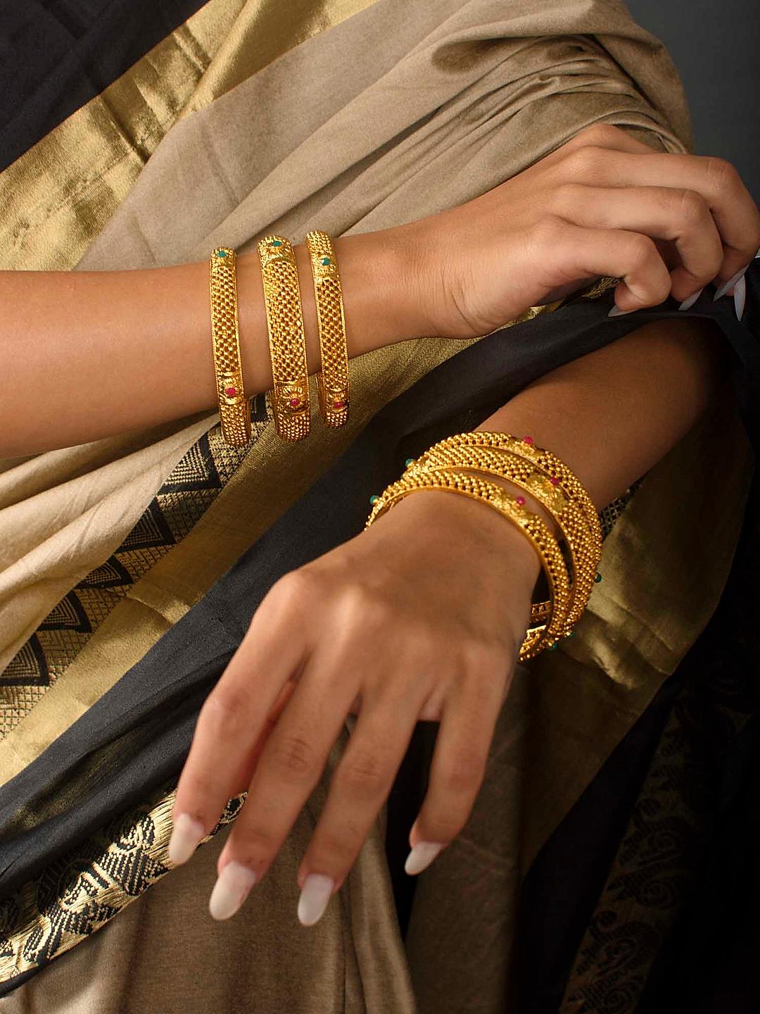 Gold stone bangles with price on sale