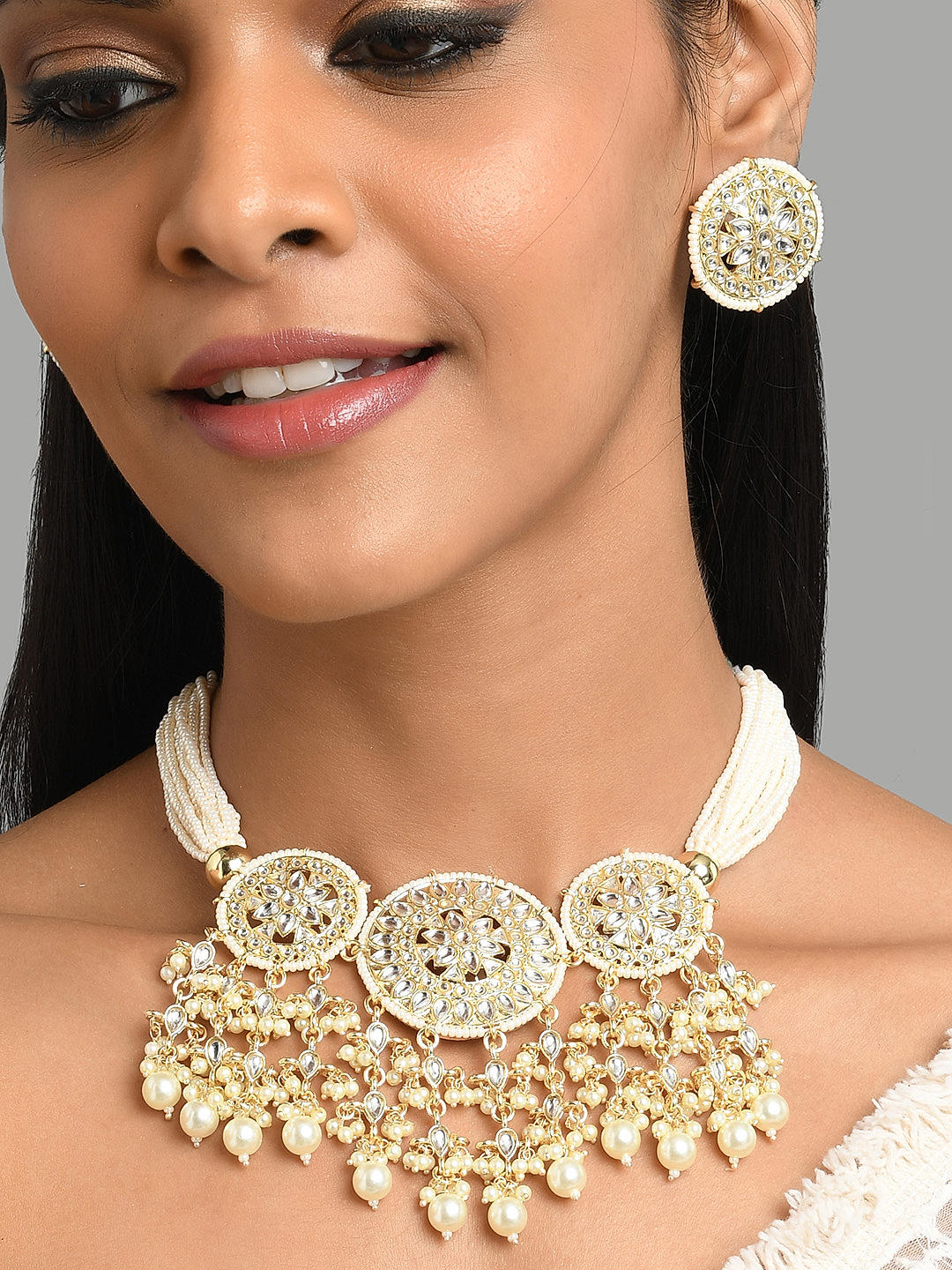 Kundan gold necklace price best sale