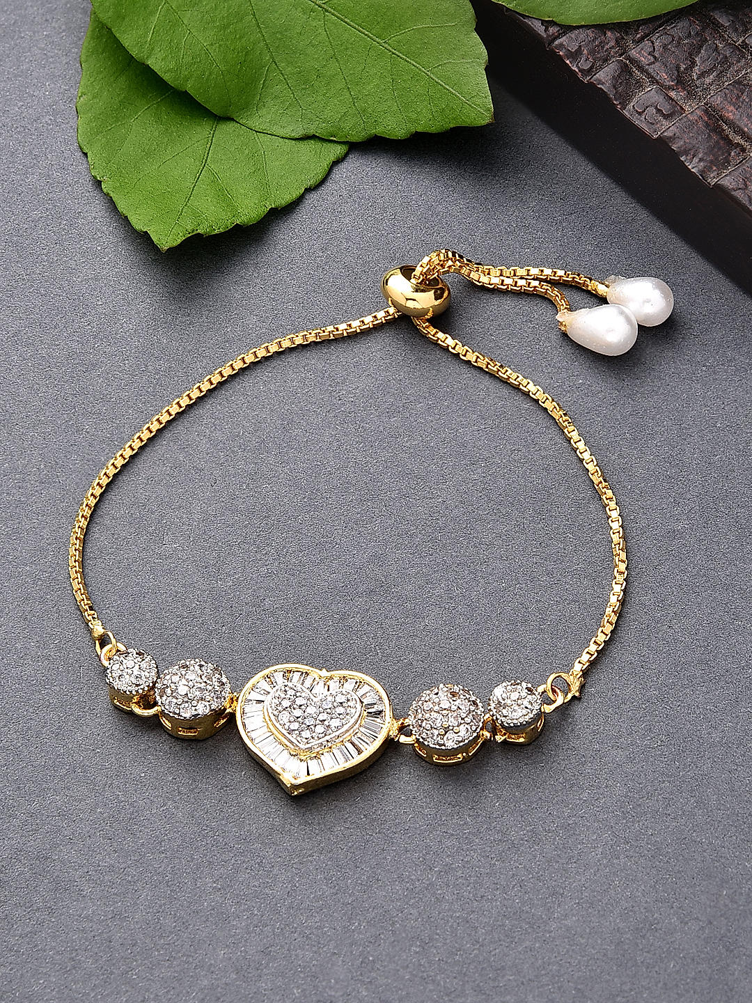 ToniQ Gold Plated American Diamond Heart Shaped Adjustable Bracelet For Women