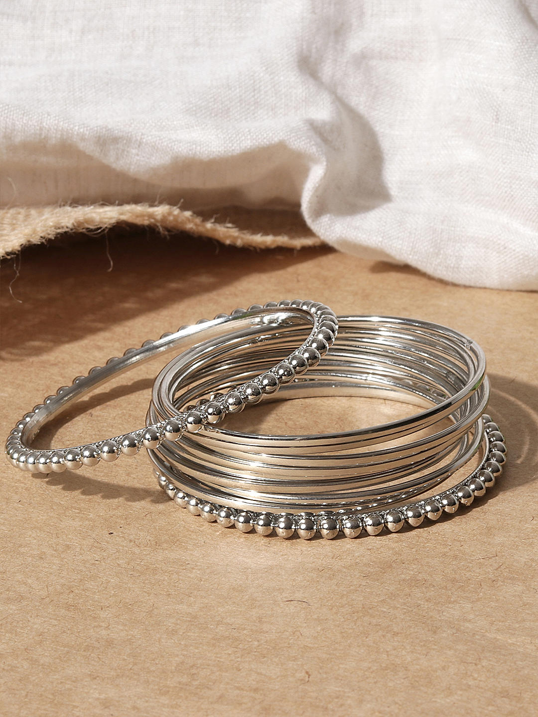 Buy Fida Set Of 10 Metal Silver Bangles Best Price