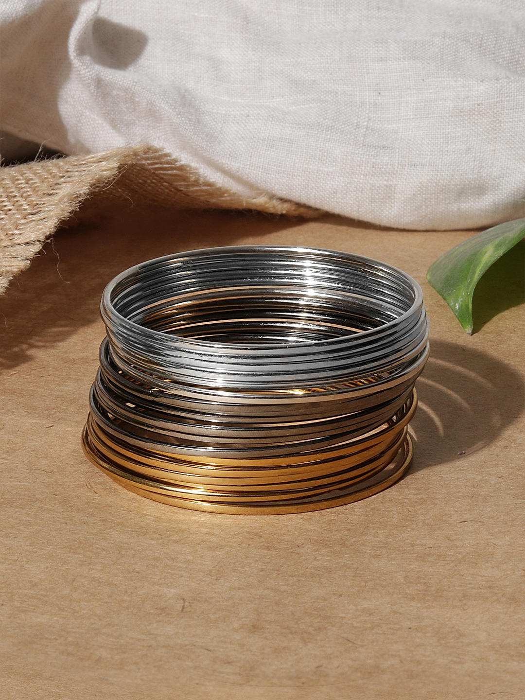 Golden metal bangles set top