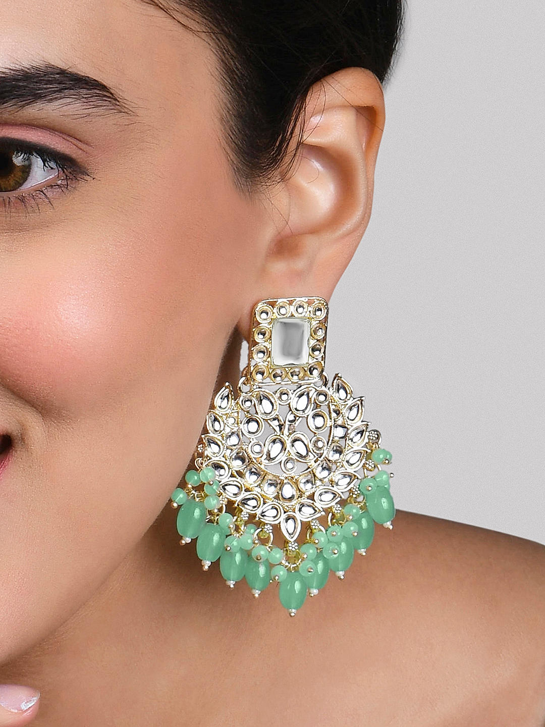Green ethnic earrings hotsell