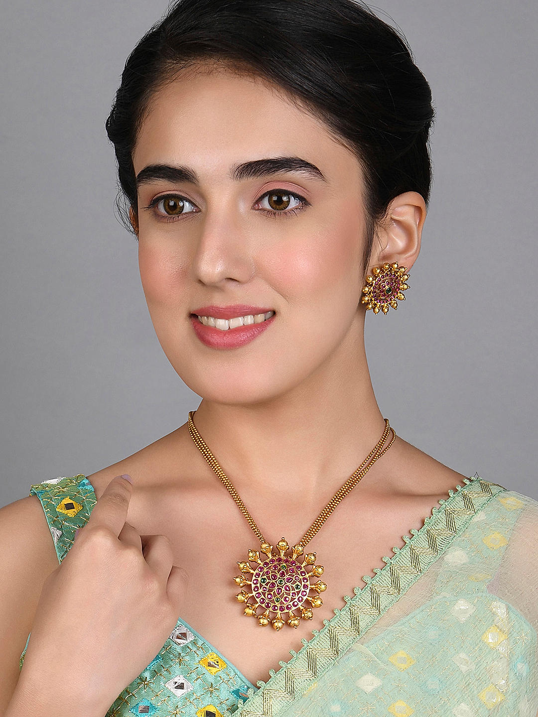 Green temple jewellery top