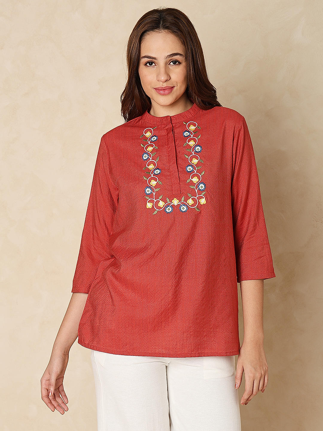 Chandheri short kurti with pleated upper yoke & billowy sleeves, along with  pleated pants