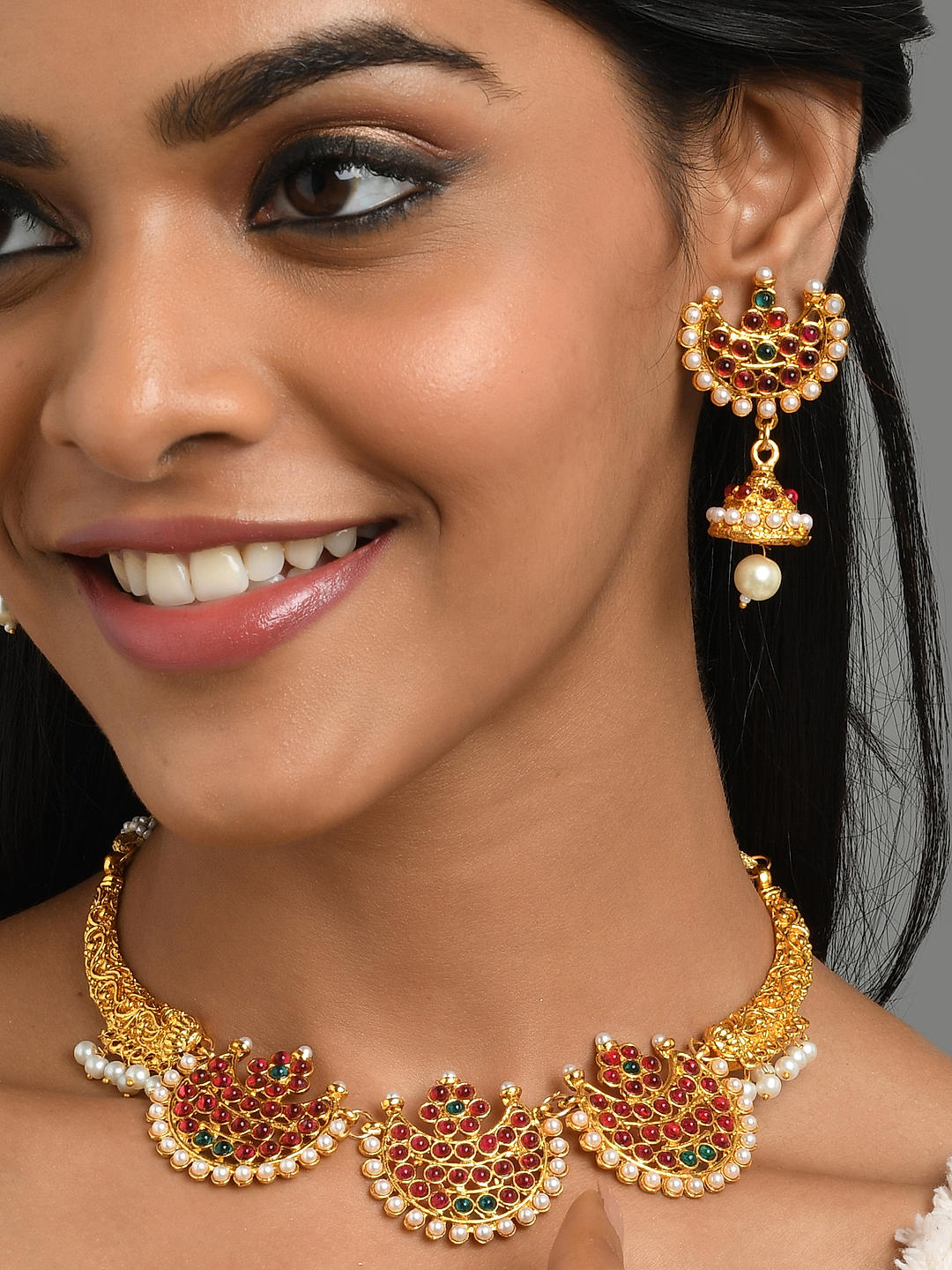 This designer Light Orange Jewellery Set detailed with Diamond buy from  India -