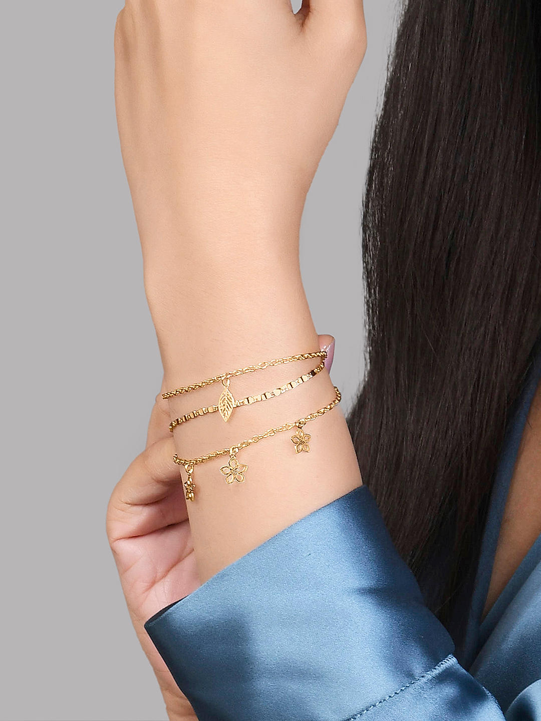 Buy Set of 5 gold toned crystal studded 3 bracelets and 2 cuffs Online