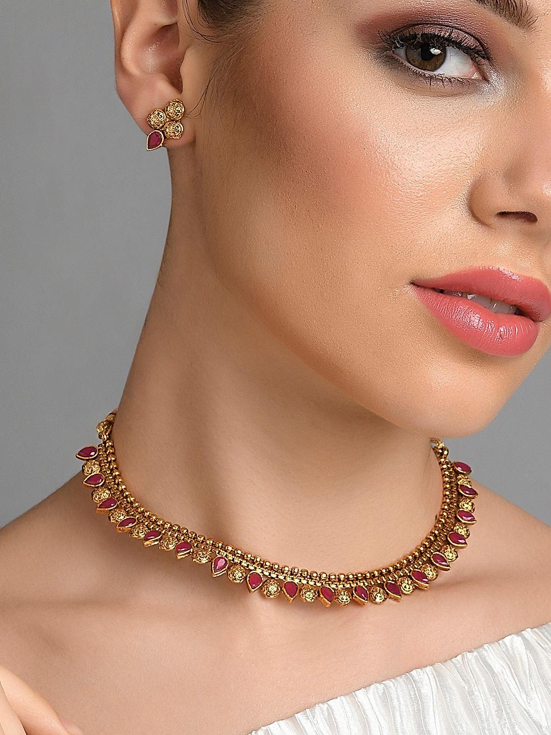 Shop Rubans Finely Handcrafted Gold Plated CZ and Faux Ruby And Pearl  Studded Statement Choker Necklace Set Online at Rubans