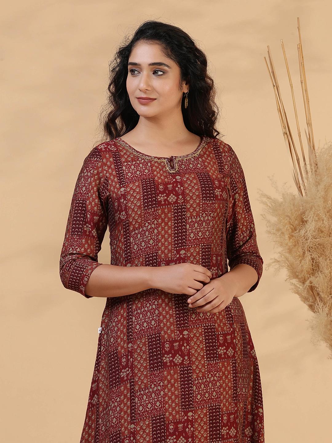 Burnt brown muslin kurti with foil print with sequins embroidery
