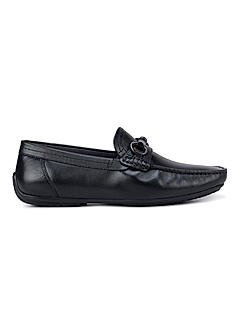 Black Moccasins With Metal Embellishments
