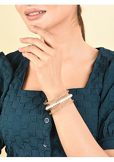 Toniq Gorgeous White Gold Plated Pearl Fusion Wear Alloy Bracelet For Women