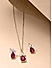 Toniq Red CZ Stone Drop Shape Casual Wear Pendant Charm Chain with Earrings Jewellery Set for Women