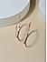 Toniq White Rose Gold Plated CZ Stone Studded Party Wear Alloy Hoop Earrings For Women