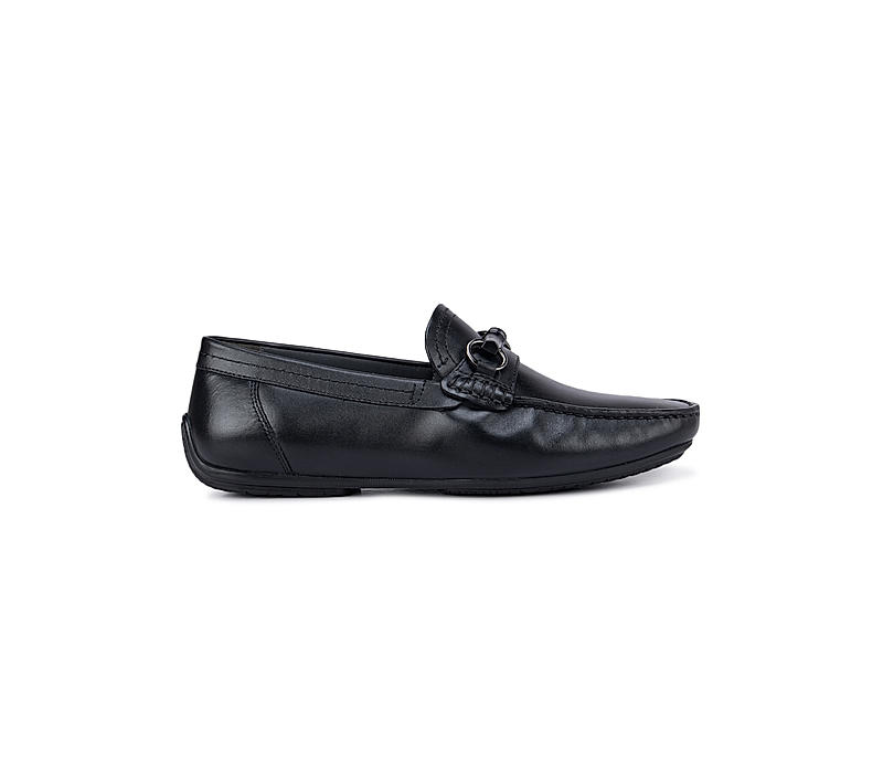 Black Moccasins With Metal Embellishments