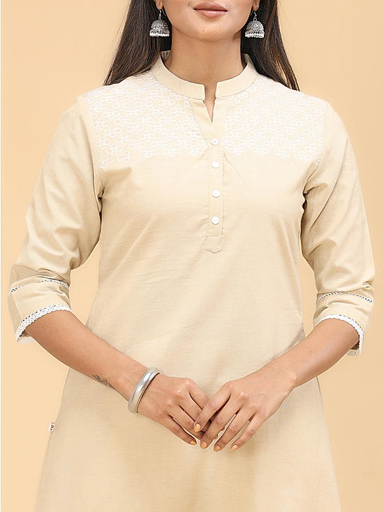 Beige handloom cotton kurti with embroidery and lace detailing