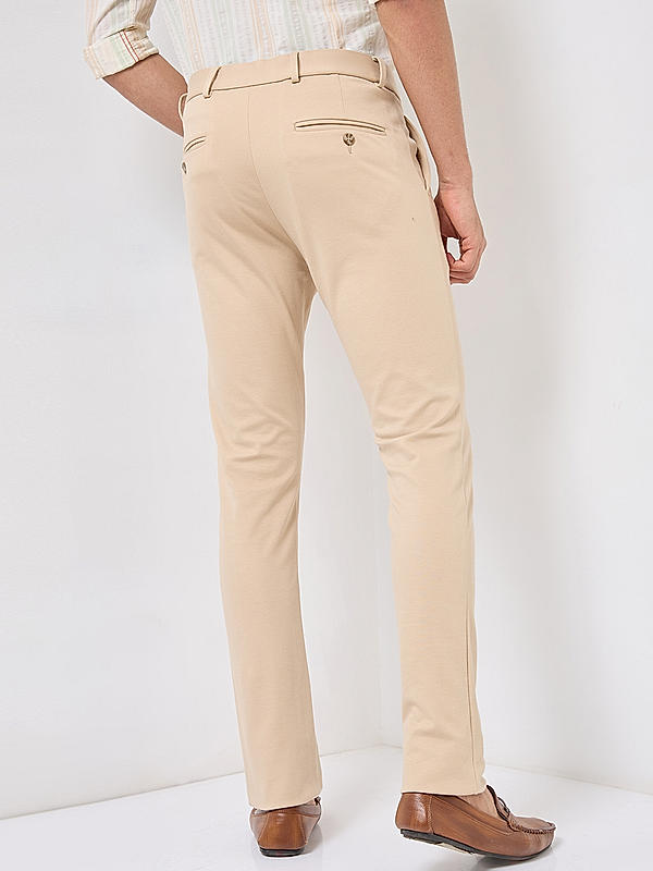 Men Slim Fit Cream Solid Trousers