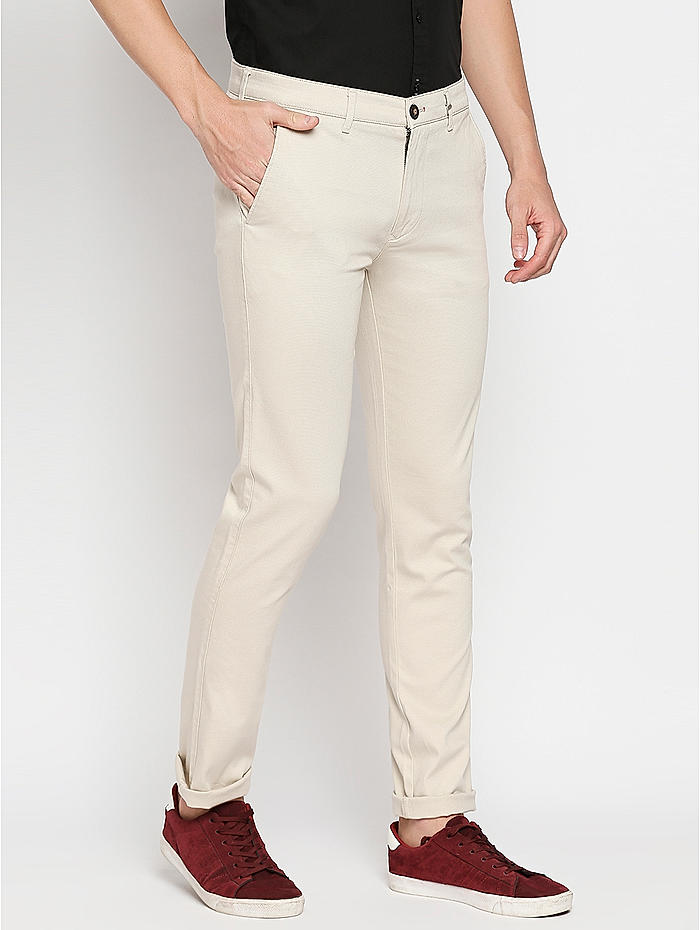 Cream Trousers With Flap Closure Design by Dhruv Vaish at Pernias Pop Up  Shop 2023