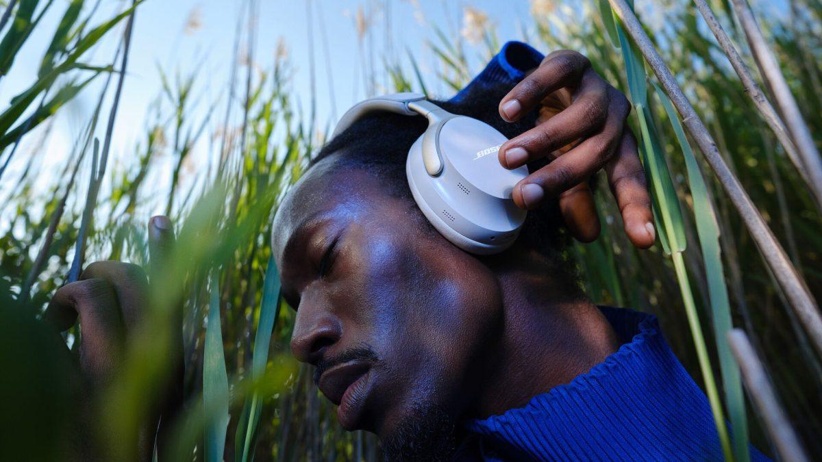 Man wearing Bose QuietComfort Ultra Headphones outside